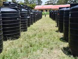 Six 10,000 litre tanks and 30 three-thousand litre tanks assembled at Wera Primary School on October 9, 2023. Image: The Star